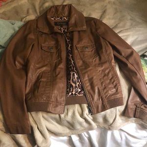 Brown leather jacket (never wore)